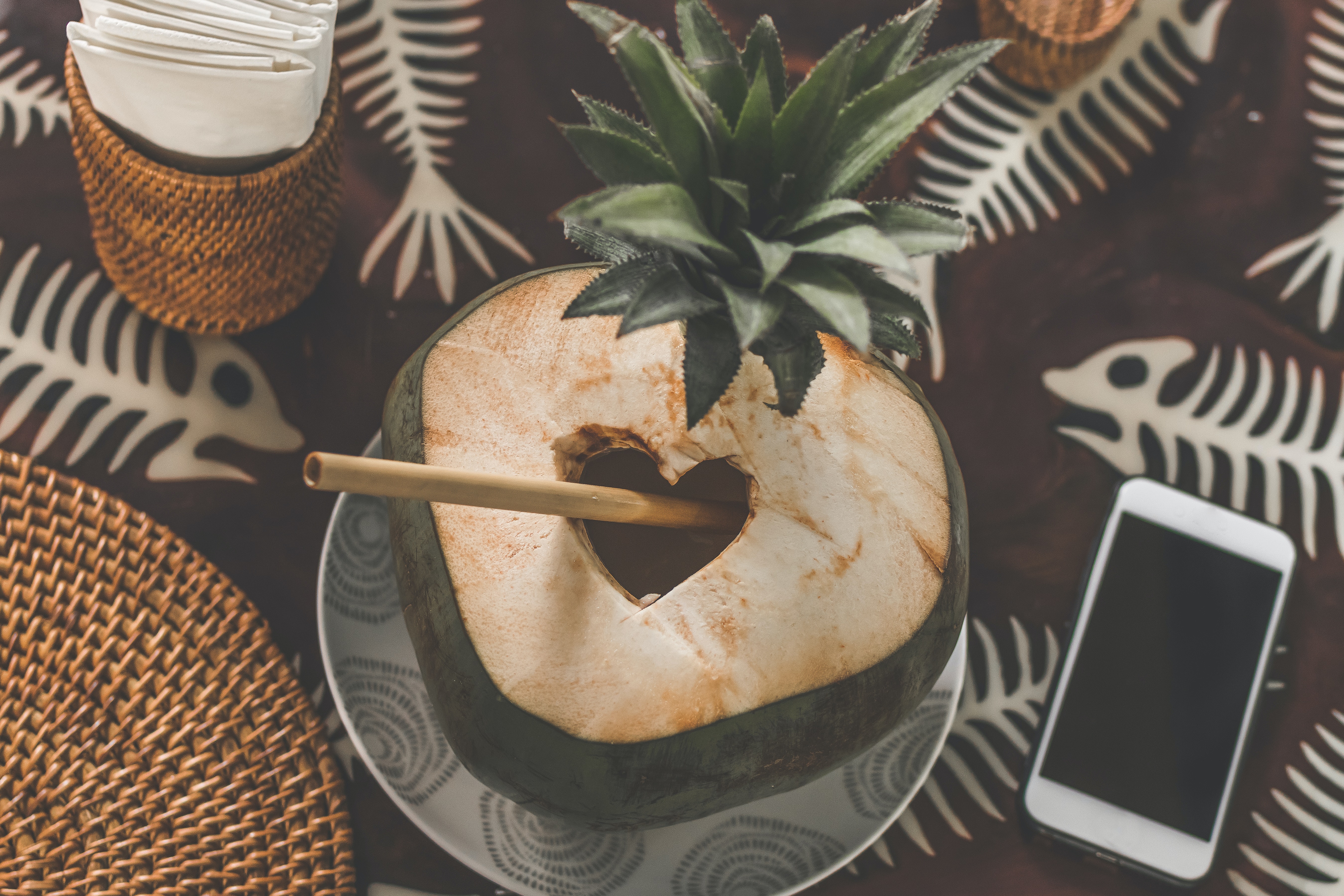coconut-juice-with-straw-near-smartphone-2304998